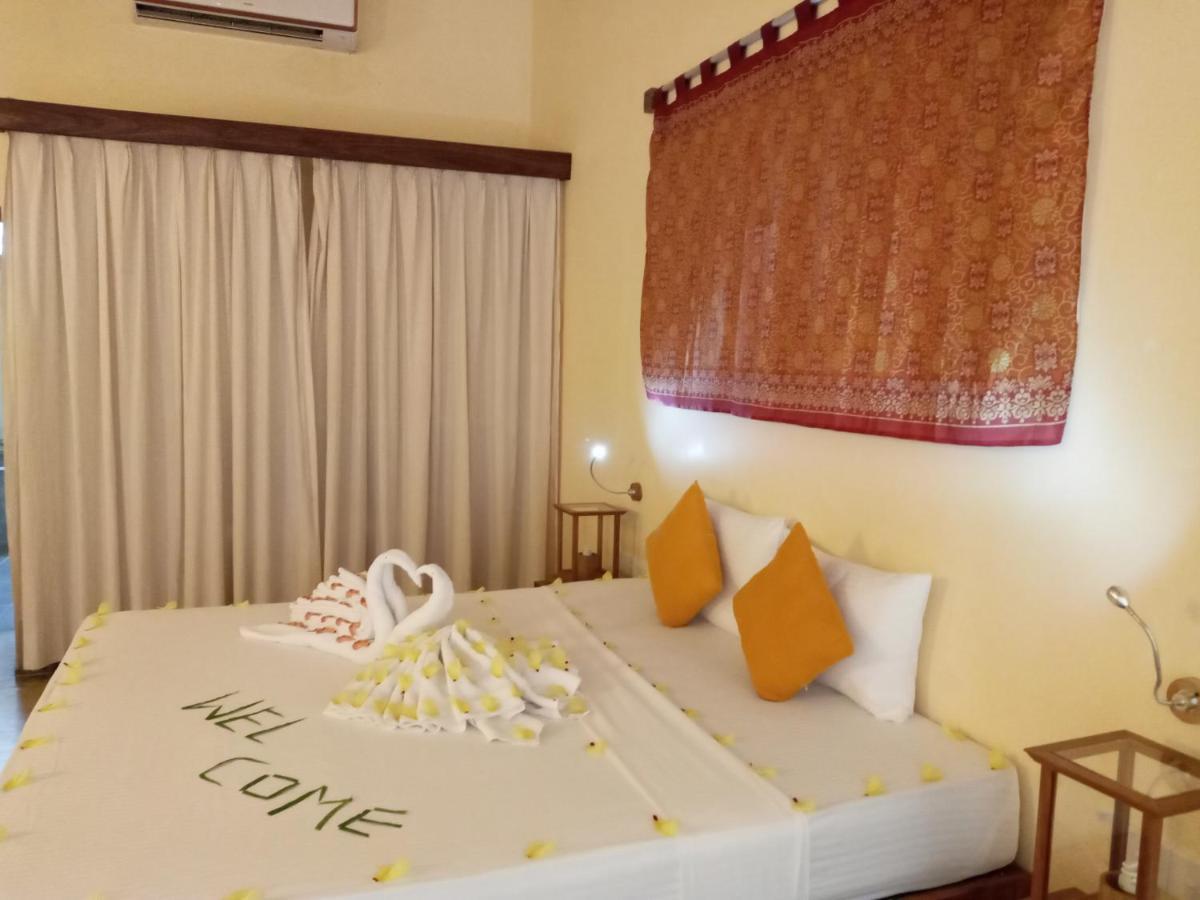 Giman Free Beach Resort Passikudah Kültér fotó