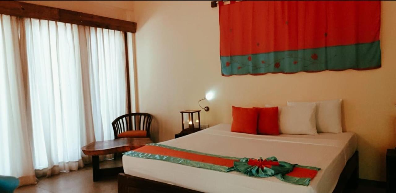 Giman Free Beach Resort Passikudah Kültér fotó